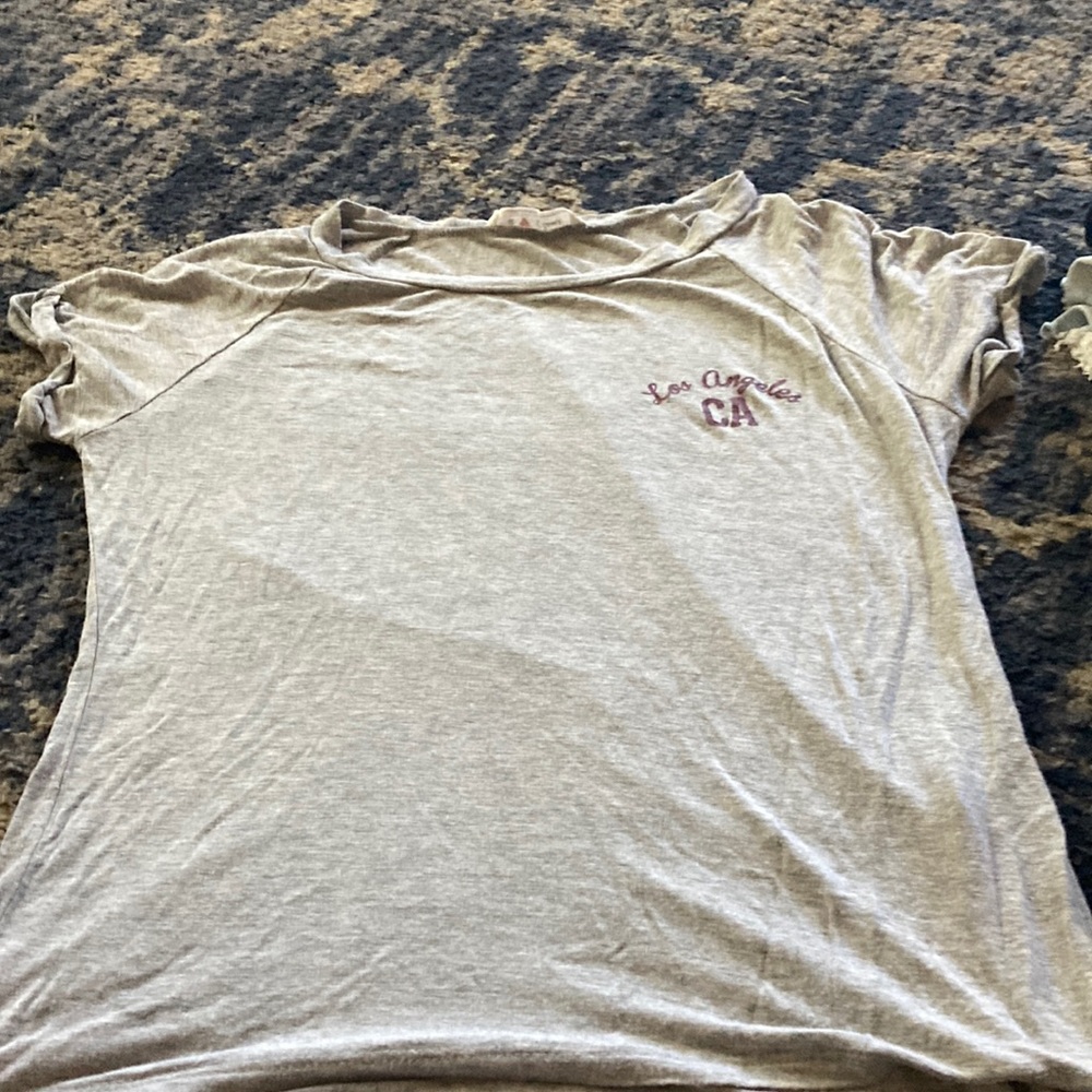 a soft grey shirt